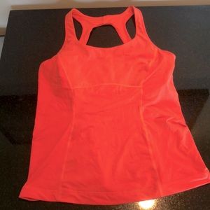 Lululemon Size 8 coral work out top.